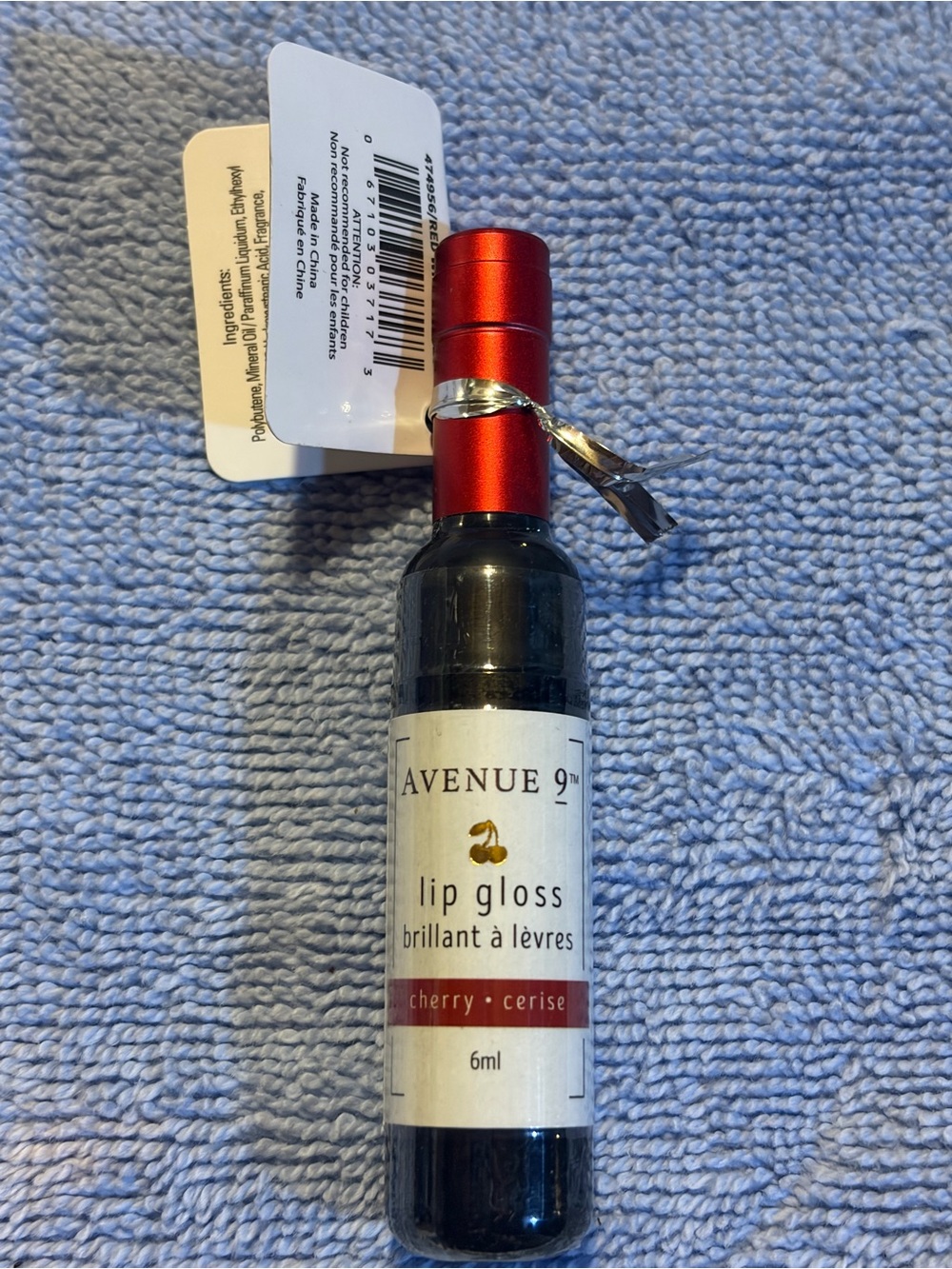 Avenue 9 Cherry Wine Bottle Lip Gloss, new/unopened. Exp 12/2027